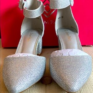 Brand new beautiful ankle strap sparkling silver sandal. Size8.5